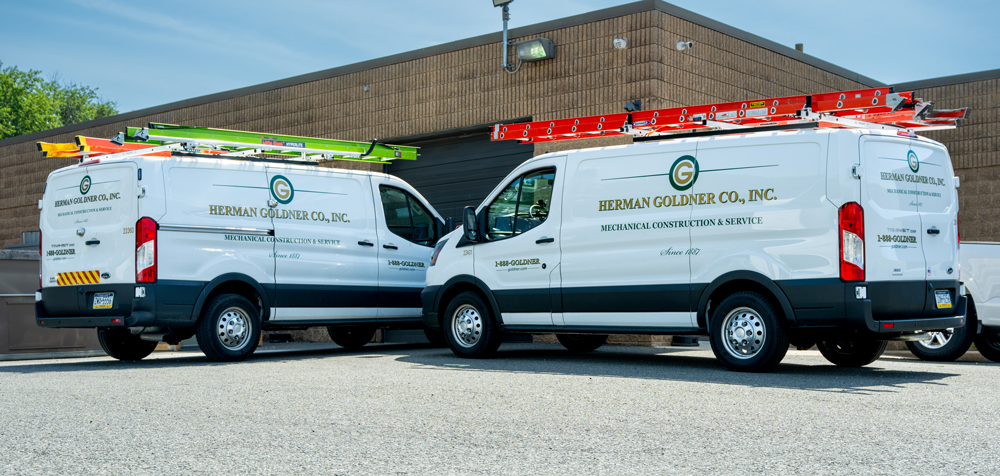 Herman Goldner Co., Inc. mechanical construction and service vehicles equipped for 24/7 commercial and industrial HVAC, plumbing, and process piping support.