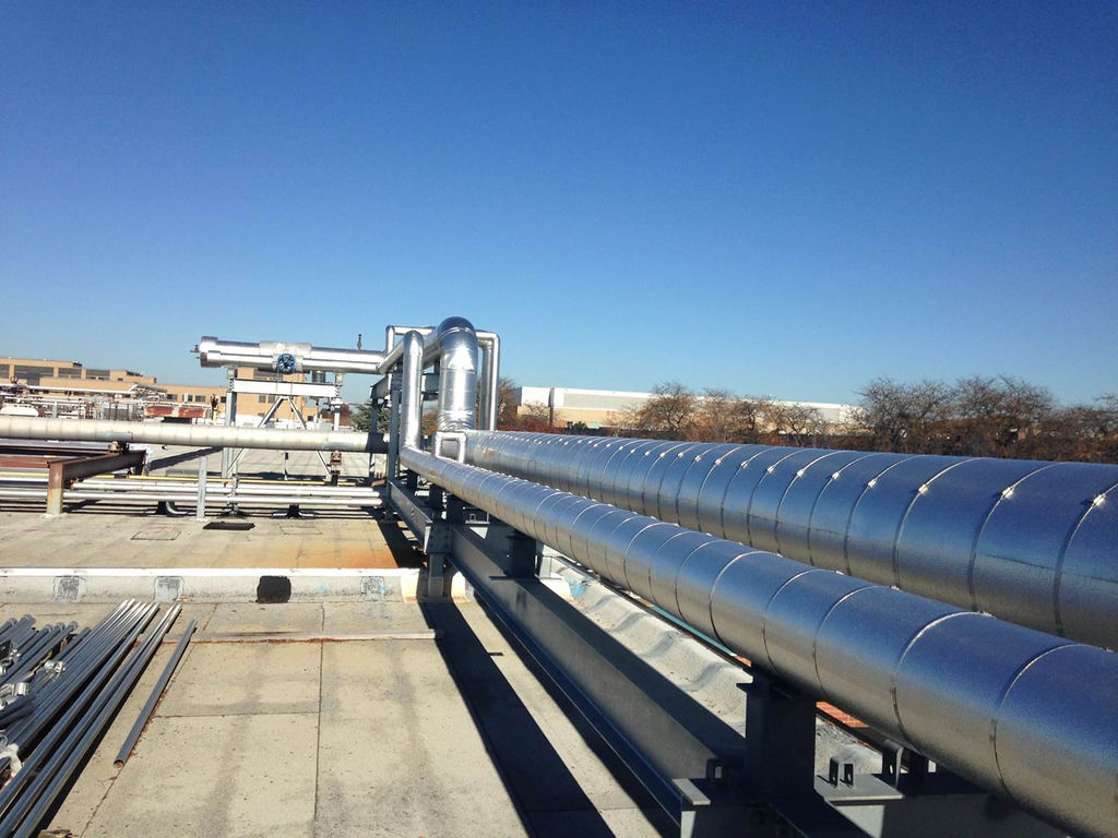 Herman Goldner team inspecting steam main piping during reliability project