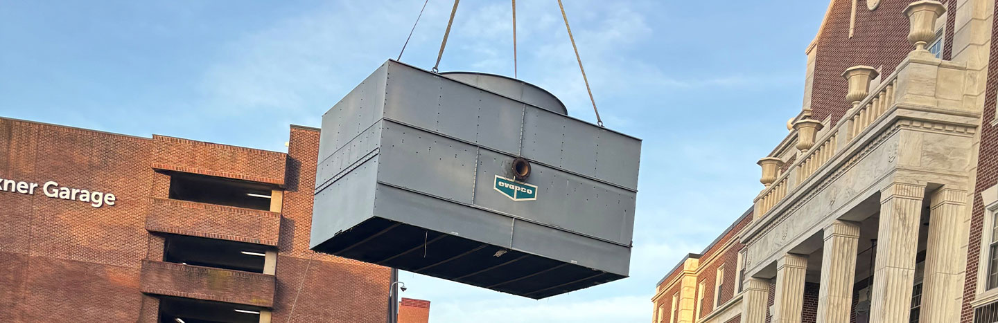 TJU Abington Hospital exterior with crane and helipad — cooling tower replacement project